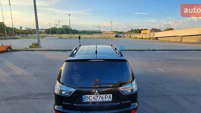 Черный Мицубиси Аутлендер, объемом двигателя 2.36 л и пробегом 285 тыс. км за 11300 $, фото 23 на Automoto.ua