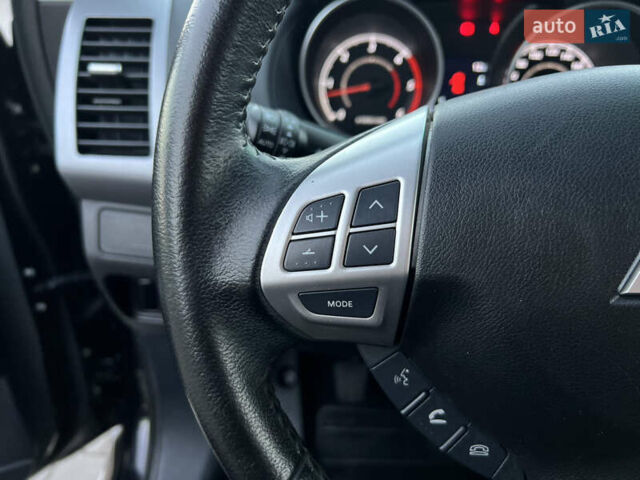 Чорний Міцубісі Аутлендер, об'ємом двигуна 2.3 л та пробігом 124 тис. км за 11999 $, фото 44 на Automoto.ua