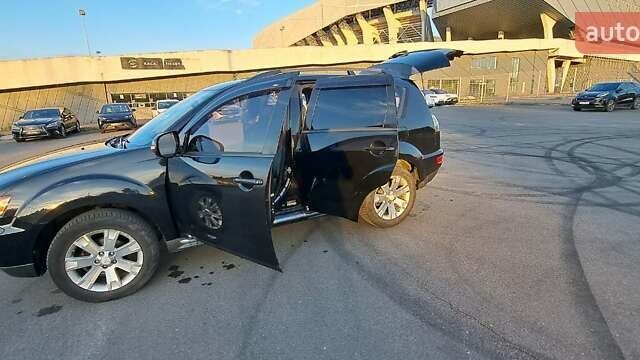 Черный Мицубиси Аутлендер, объемом двигателя 2.36 л и пробегом 285 тыс. км за 11300 $, фото 31 на Automoto.ua