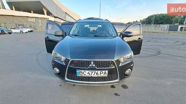 Черный Мицубиси Аутлендер, объемом двигателя 2.36 л и пробегом 285 тыс. км за 11300 $, фото 7 на Automoto.ua