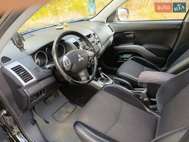 Черный Мицубиси Аутлендер, объемом двигателя 2.2 л и пробегом 218 тыс. км за 11800 $, фото 4 на Automoto.ua