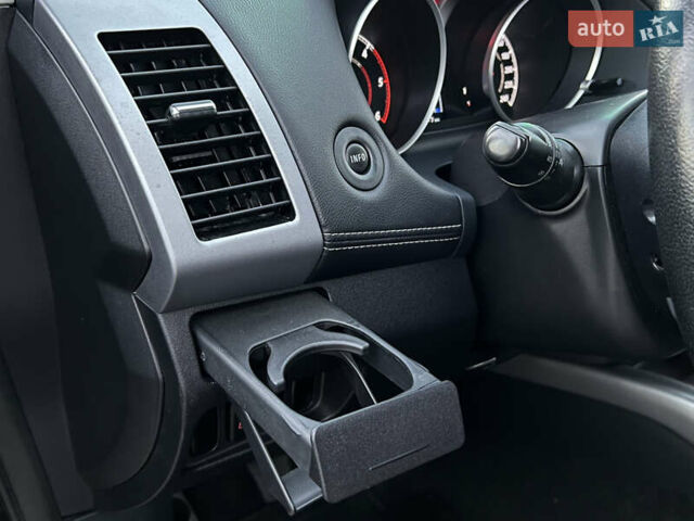 Чорний Міцубісі Аутлендер, об'ємом двигуна 2.3 л та пробігом 124 тис. км за 11999 $, фото 62 на Automoto.ua