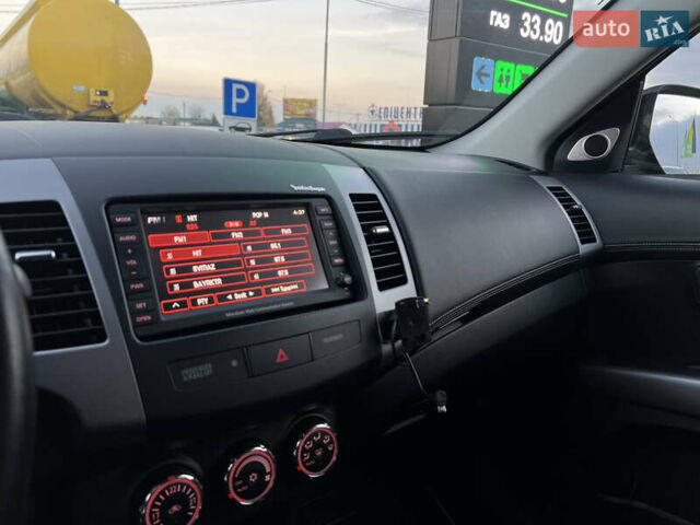 Чорний Міцубісі Аутлендер, об'ємом двигуна 2.3 л та пробігом 124 тис. км за 11999 $, фото 55 на Automoto.ua