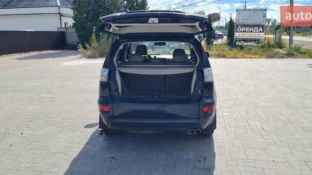 Черный Мицубиси Аутлендер, объемом двигателя 2.27 л и пробегом 195 тыс. км за 10500 $, фото 15 на Automoto.ua