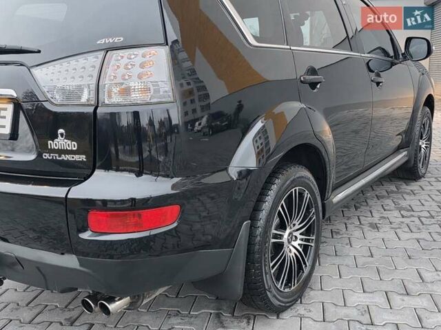 Черный Мицубиси Аутлендер, объемом двигателя 2.2 л и пробегом 188 тыс. км за 10999 $, фото 20 на Automoto.ua