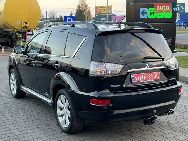 Чорний Міцубісі Аутлендер, об'ємом двигуна 2.3 л та пробігом 124 тис. км за 11999 $, фото 110 на Automoto.ua