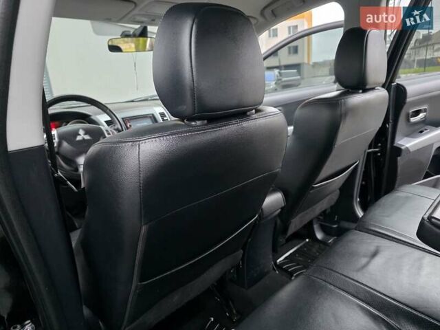 Черный Мицубиси Аутлендер, объемом двигателя 2.2 л и пробегом 188 тыс. км за 10999 $, фото 43 на Automoto.ua