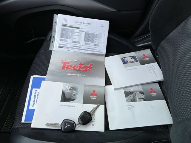 Черный Мицубиси Аутлендер, объемом двигателя 2.3 л и пробегом 124 тыс. км за 11999 $, фото 23 на Automoto.ua