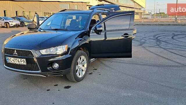 Черный Мицубиси Аутлендер, объемом двигателя 2.36 л и пробегом 285 тыс. км за 11300 $, фото 29 на Automoto.ua