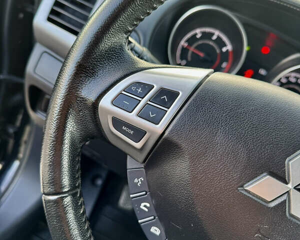 Мицубиси Аутлендер 2012 в Полтаве на Automoto.ua Черный Мицубиси Аутлендер, объемом двигателя 2.3 л и пробегом 194 тыс. км за 11450 $, фото 17 на Automoto.ua