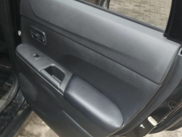 Міцубісі Аутлендер 2012 у Костополе на Automoto.ua Чорний Міцубісі Аутлендер, об'ємом двигуна 1.8 л та пробігом 248 тис. км за 10500 $, фото 12 на Automoto.ua