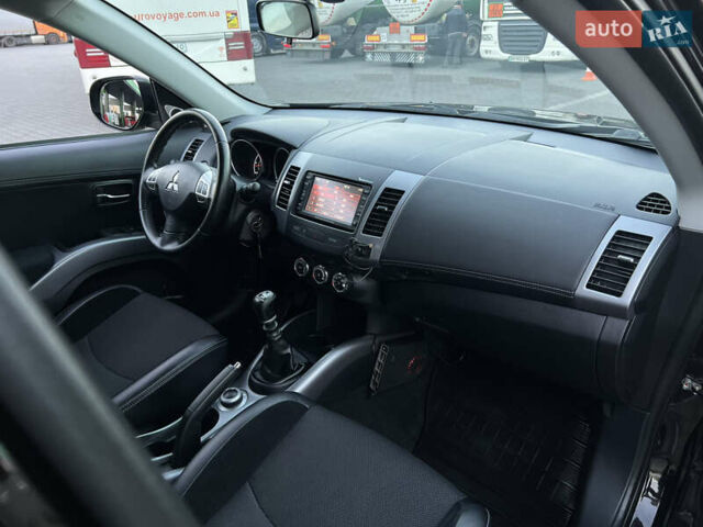Чорний Міцубісі Аутлендер, об'ємом двигуна 2.3 л та пробігом 124 тис. км за 11999 $, фото 35 на Automoto.ua