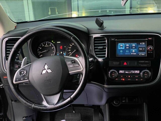 Черный Мицубиси Аутлендер, объемом двигателя 2.4 л и пробегом 212 тыс. км за 12990 $, фото 20 на Automoto.ua