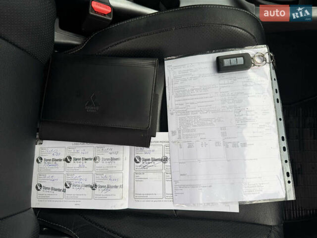 Черный Мицубиси Аутлендер, объемом двигателя 2.2 л и пробегом 215 тыс. км за 11450 $, фото 38 на Automoto.ua