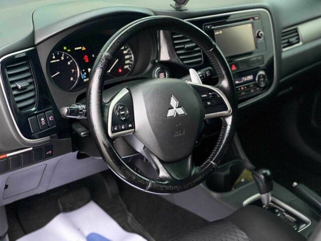 Черный Мицубиси Аутлендер, объемом двигателя 2.4 л и пробегом 212 тыс. км за 12990 $, фото 13 на Automoto.ua