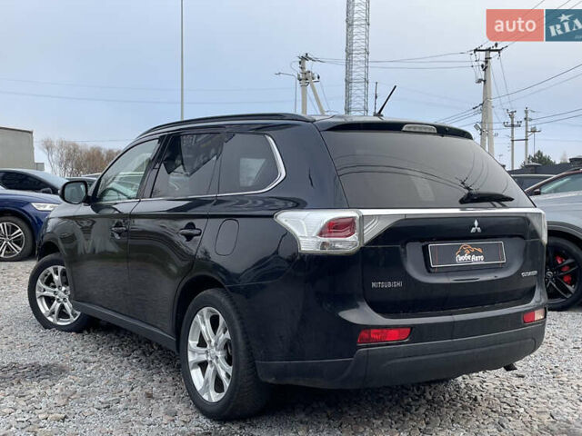 Чорний Міцубісі Аутлендер, об'ємом двигуна 2.27 л та пробігом 203 тис. км за 12600 $, фото 4 на Automoto.ua