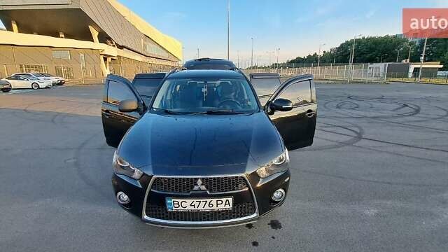 Черный Мицубиси Аутлендер, объемом двигателя 2.36 л и пробегом 285 тыс. км за 11300 $, фото 20 на Automoto.ua