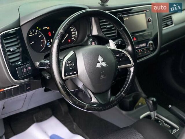 Черный Мицубиси Аутлендер, объемом двигателя 2.36 л и пробегом 212 тыс. км за 12990 $, фото 22 на Automoto.ua