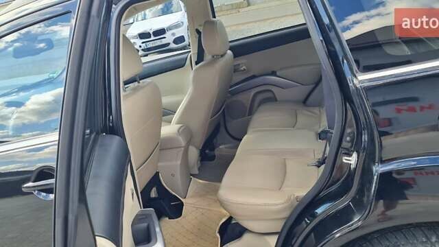 Черный Мицубиси Аутлендер, объемом двигателя 2.27 л и пробегом 195 тыс. км за 10500 $, фото 25 на Automoto.ua