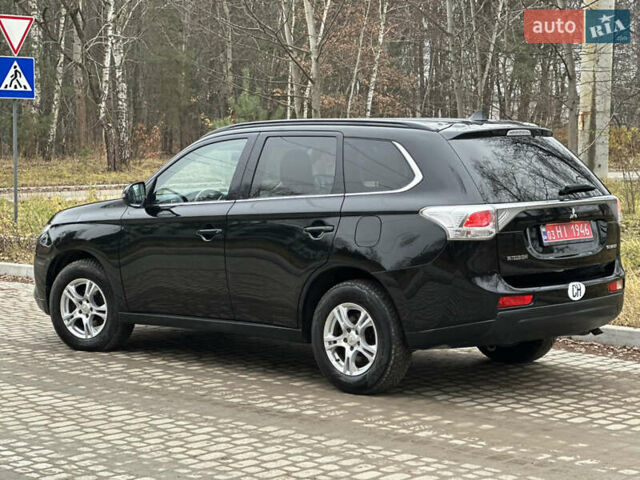 Чорний Міцубісі Аутлендер, об'ємом двигуна 2.2 л та пробігом 176 тис. км за 13500 $, фото 12 на Automoto.ua