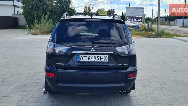 Черный Мицубиси Аутлендер, объемом двигателя 2.27 л и пробегом 195 тыс. км за 10500 $, фото 7 на Automoto.ua