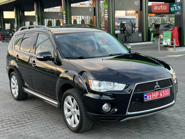 Чорний Міцубісі Аутлендер, об'ємом двигуна 2.3 л та пробігом 124 тис. км за 11999 $, фото 108 на Automoto.ua