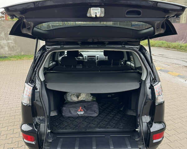 Чорний Міцубісі Аутлендер, об'ємом двигуна 2.36 л та пробігом 96 тис. км за 11700 $, фото 27 на Automoto.ua