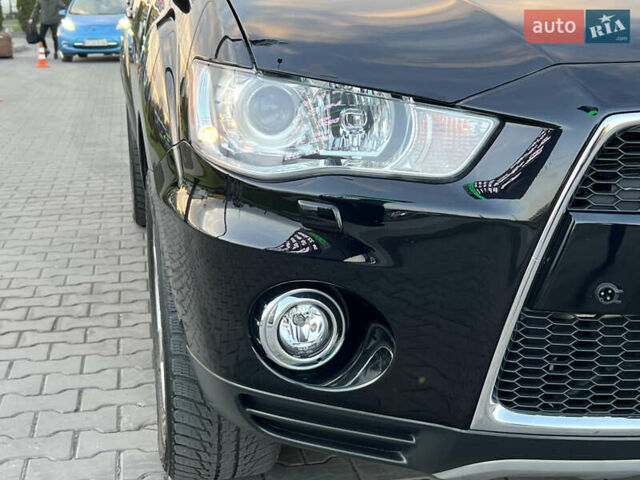 Чорний Міцубісі Аутлендер, об'ємом двигуна 2.3 л та пробігом 124 тис. км за 11999 $, фото 25 на Automoto.ua