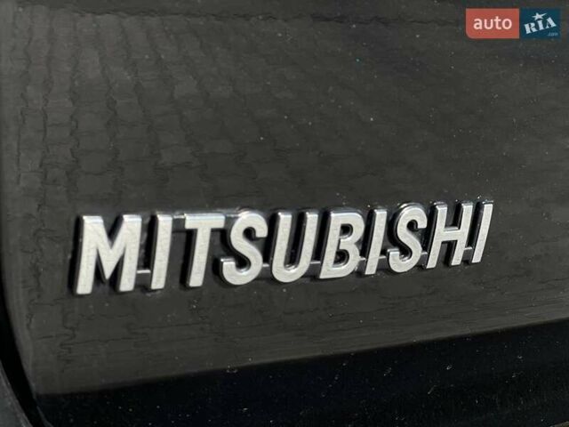 Черный Мицубиси Аутлендер, объемом двигателя 2.36 л и пробегом 212 тыс. км за 11490 $, фото 16 на Automoto.ua