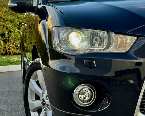 Мицубиси Аутлендер 2012 в Полтаве на Automoto.ua Черный Мицубиси Аутлендер, объемом двигателя 2.3 л и пробегом 194 тыс. км за 11450 $, фото 7 на Automoto.ua