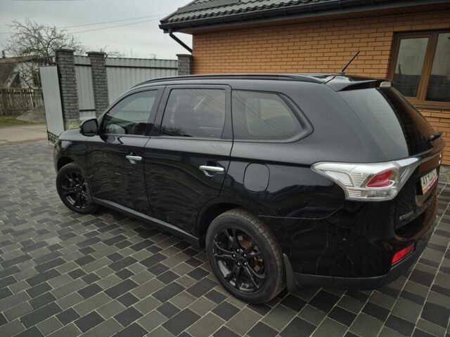 Черный Мицубиси Аутлендер, объемом двигателя 2.4 л и пробегом 211 тыс. км за 12590 $, фото 9 на Automoto.ua