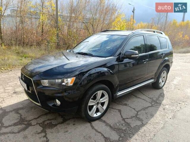 Черный Мицубиси Аутлендер, объемом двигателя 2.2 л и пробегом 218 тыс. км за 11800 $, фото 6 на Automoto.ua