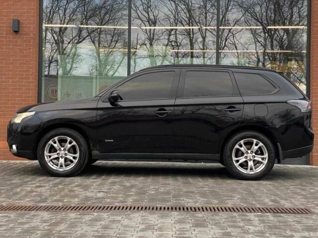 Черный Мицубиси Аутлендер, объемом двигателя 2.4 л и пробегом 212 тыс. км за 12990 $, фото 3 на Automoto.ua