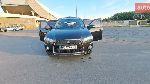 Черный Мицубиси Аутлендер, объемом двигателя 2.36 л и пробегом 285 тыс. км за 11300 $, фото 34 на Automoto.ua