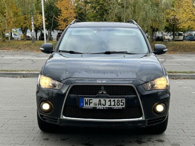 Черный Мицубиси Аутлендер, объемом двигателя 2 л и пробегом 250 тыс. км за 4850 $, фото 7 на Automoto.ua