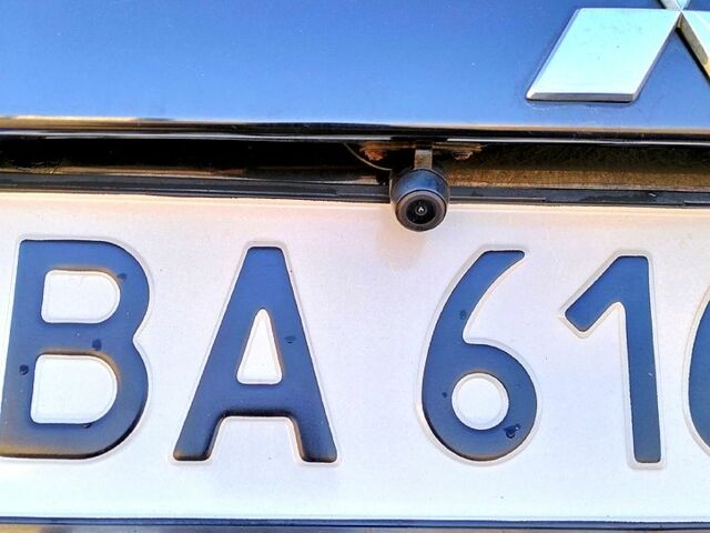 Черный Мицубиси Аутлендер, объемом двигателя 2.4 л и пробегом 140 тыс. км за 10500 $, фото 6 на Automoto.ua