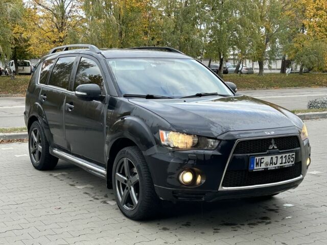 Черный Мицубиси Аутлендер, объемом двигателя 2 л и пробегом 250 тыс. км за 4850 $, фото 6 на Automoto.ua