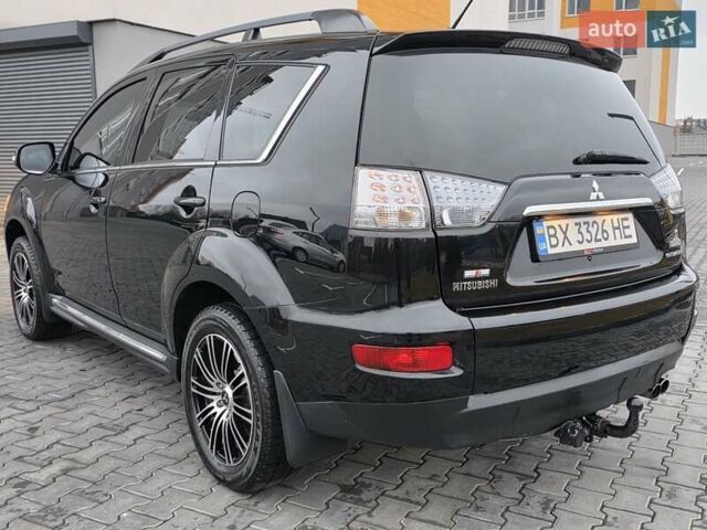 Черный Мицубиси Аутлендер, объемом двигателя 2.2 л и пробегом 188 тыс. км за 10999 $, фото 13 на Automoto.ua