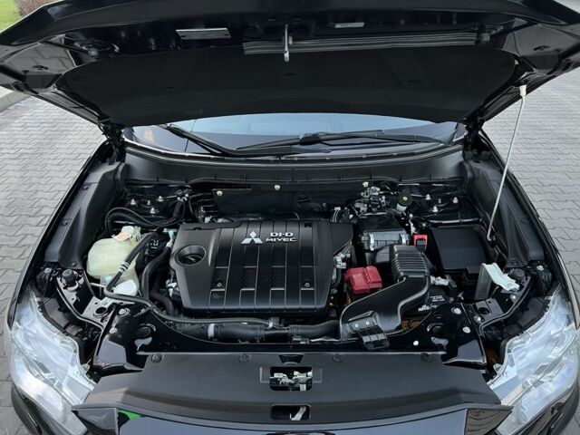 Черный Мицубиси Аутлендер, объемом двигателя 2.3 л и пробегом 124 тыс. км за 11999 $, фото 22 на Automoto.ua