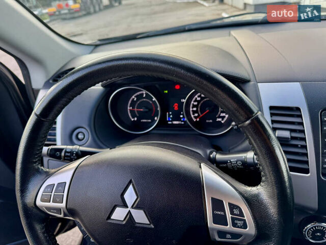 Мицубиси Аутлендер 2012 в Полтаве на Automoto.ua Черный Мицубиси Аутлендер, объемом двигателя 2.3 л и пробегом 194 тыс. км за 11450 $, фото 19 на Automoto.ua