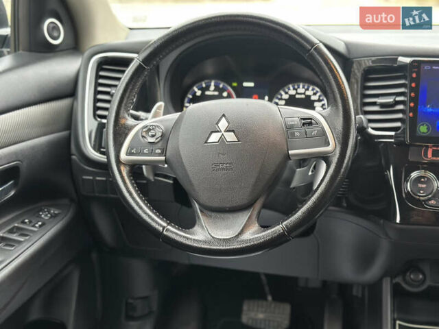 Чорний Міцубісі Аутлендер, об'ємом двигуна 2.2 л та пробігом 176 тис. км за 13500 $, фото 25 на Automoto.ua