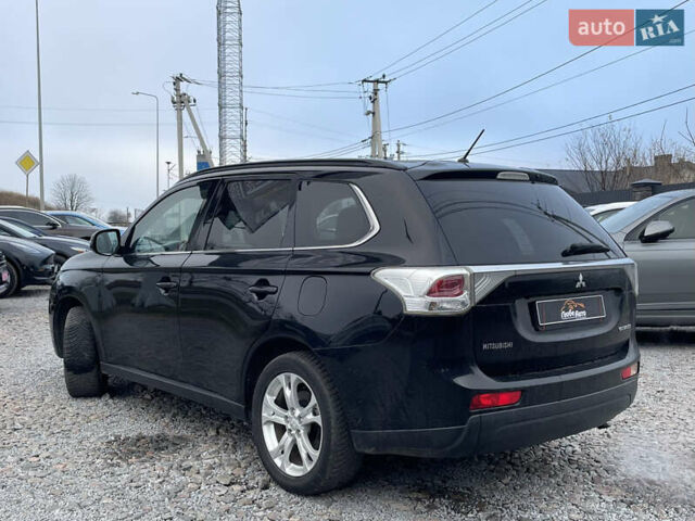 Чорний Міцубісі Аутлендер, об'ємом двигуна 2.27 л та пробігом 203 тис. км за 12600 $, фото 6 на Automoto.ua