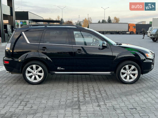 Чорний Міцубісі Аутлендер, об'ємом двигуна 2.3 л та пробігом 124 тис. км за 11999 $, фото 8 на Automoto.ua