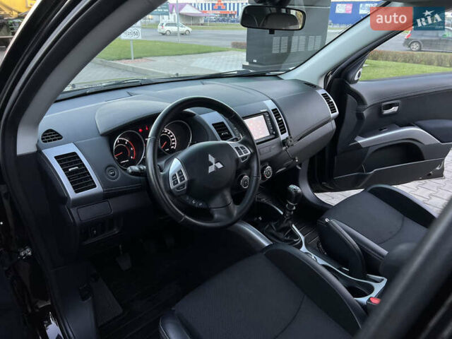Чорний Міцубісі Аутлендер, об'ємом двигуна 2.3 л та пробігом 124 тис. км за 11999 $, фото 37 на Automoto.ua