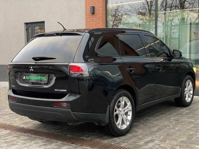 Черный Мицубиси Аутлендер, объемом двигателя 2.4 л и пробегом 212 тыс. км за 12990 $, фото 7 на Automoto.ua
