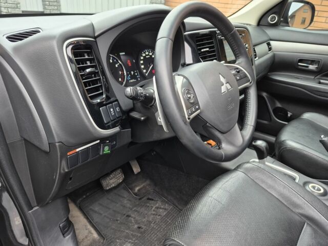 Черный Мицубиси Аутлендер, объемом двигателя 2.4 л и пробегом 211 тыс. км за 12590 $, фото 15 на Automoto.ua