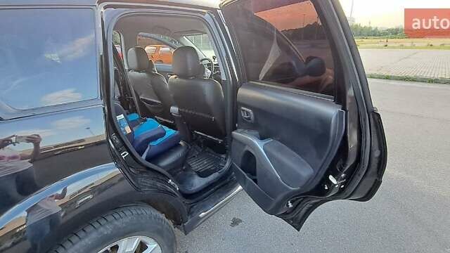 Черный Мицубиси Аутлендер, объемом двигателя 2.36 л и пробегом 285 тыс. км за 11300 $, фото 6 на Automoto.ua