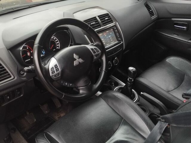 Міцубісі Аутлендер 2012 у Костополе на Automoto.ua Чорний Міцубісі Аутлендер, об'ємом двигуна 1.8 л та пробігом 248 тис. км за 10500 $, фото 6 на Automoto.ua