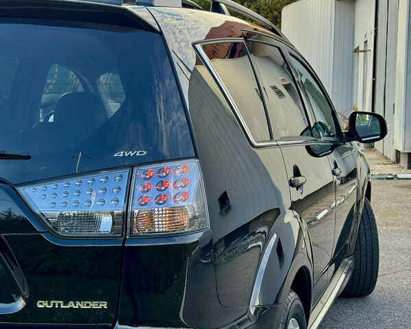Мицубиси Аутлендер 2012 в Полтаве на Automoto.ua Черный Мицубиси Аутлендер, объемом двигателя 2.3 л и пробегом 194 тыс. км за 11450 $, фото 10 на Automoto.ua