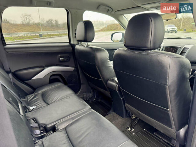 Черный Мицубиси Аутлендер, объемом двигателя 2.2 л и пробегом 215 тыс. км за 11450 $, фото 30 на Automoto.ua